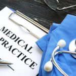 Medical malpractice. Medical suit, stethoscope and documents.