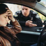 Male-cop-in-uniform-check-female-driver-on-road